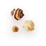 A picture of three kernels flavored Zebra®, Caramel Corn and Kettle Corn.