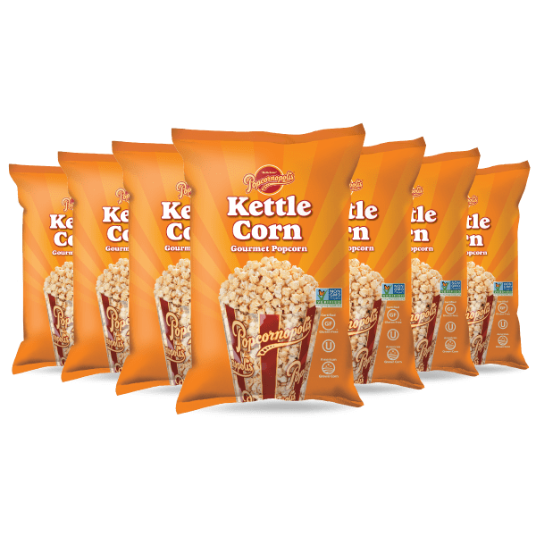 A picture of seven bags 1.5 oz of Popcornopolis® flavored Kettle Corn gourmet popcorn.