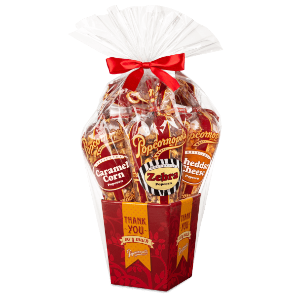 A picture of 5 regular cones Thank You of gourmet popcorn gift basket flavored of Cheddar Cheese, Caramel Corn, Zebra® and Kettle Corn.