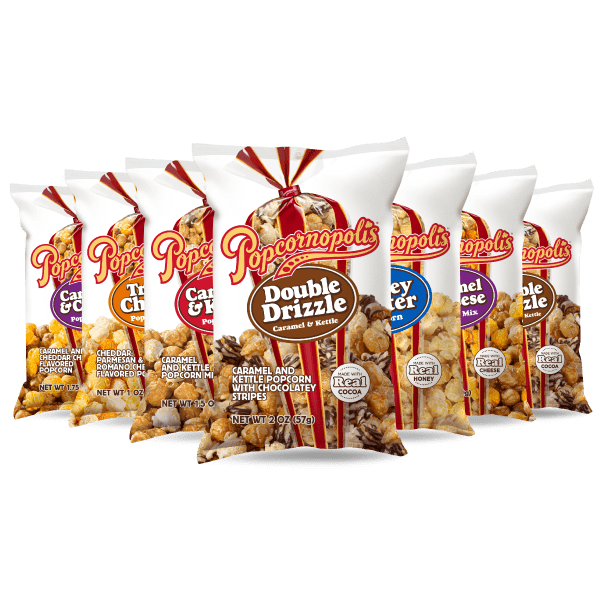 Bags of Popcornopolis® gourmet popcorn flavored Double Drizzle, Caramel& Kettle, Triple Cheese and Honey Butter assortment
