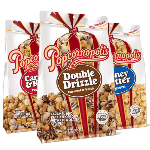 A picture of three Pouches of Popcornopolis® gourmet popcorn Caramel & Kettle, Double Drizzle and Honey Butter.