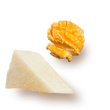 A picture of a Triple Cheese kernel and a chuck of cheese.