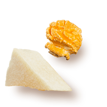 A picture of a Triple Cheese kernel and a chuck of cheese.